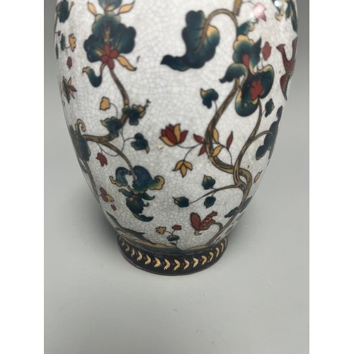 11 - Chinese Crackle Glaze Ceramic Vase Flowering Branches Birds. A white crackle-glazed ceramic vase, de... 