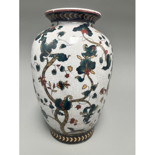 11 - Chinese Crackle Glaze Ceramic Vase Flowering Branches Birds. A white crackle-glazed ceramic vase, de... 