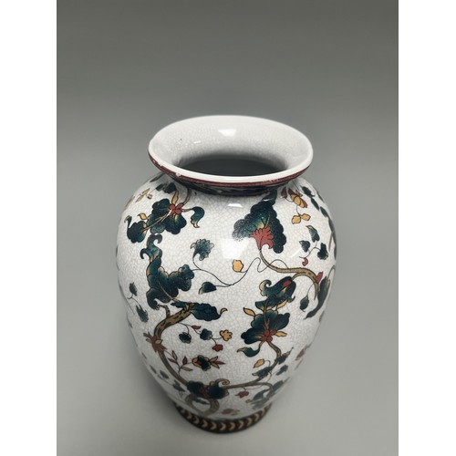 11 - Chinese Crackle Glaze Ceramic Vase Flowering Branches Birds. A white crackle-glazed ceramic vase, de... 