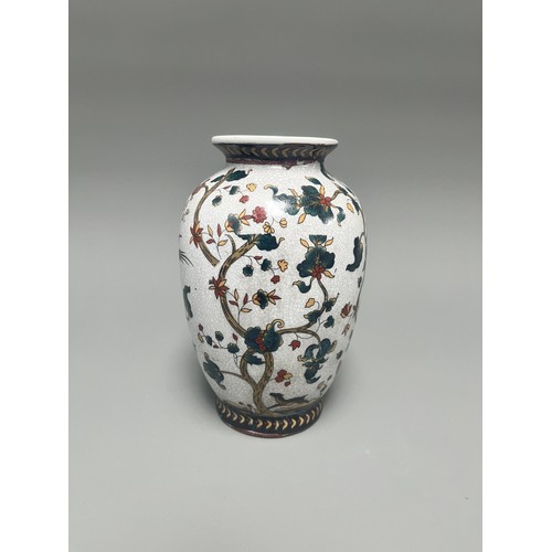11 - Chinese Crackle Glaze Ceramic Vase Flowering Branches Birds. A white crackle-glazed ceramic vase, de... 