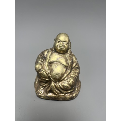 14 - Gold-Toned Tarnished Metal Happy Buddha Budai Figurine. A single gold-toned tarnished metal figurine... 