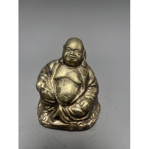 14 - Gold-Toned Tarnished Metal Happy Buddha Budai Figurine. A single gold-toned tarnished metal figurine... 