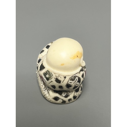 15 - Collection of East Asian Figurines including Porcelain Buddha etc. East Asian figurines including a ... 