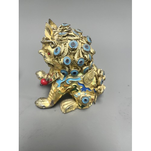 15 - Collection of East Asian Figurines including Porcelain Buddha etc. East Asian figurines including a ... 