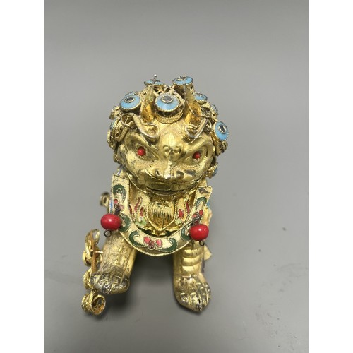 15 - Collection of East Asian Figurines including Porcelain Buddha etc. East Asian figurines including a ... 