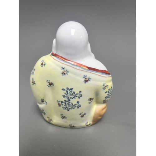 15 - Collection of East Asian Figurines including Porcelain Buddha etc. East Asian figurines including a ... 