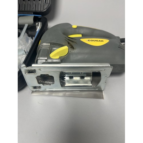 20 - COUGAR 630W Jigsaw Model CGCD24H-PJ630L and Accessories. A Collection of items including a grey and ... 