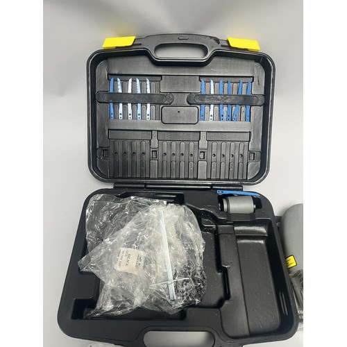 20 - COUGAR 630W Jigsaw Model CGCD24H-PJ630L and Accessories. A Collection of items including a grey and ... 