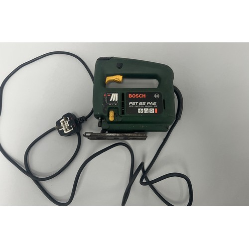 18 - Bosch PST 65 PAE Electronic SDS Jigsaw 400 W.
A single dark green and yellow Bosch PST 65 PAE electr... 