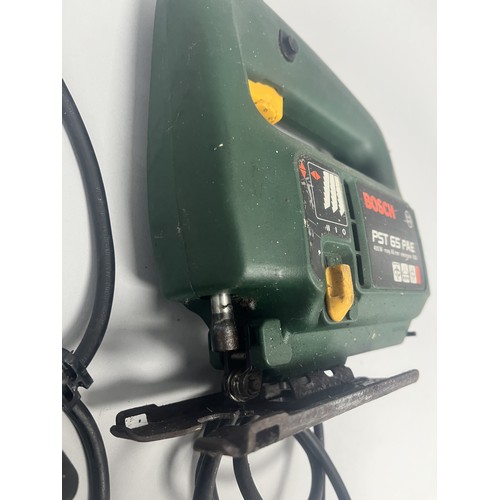 18 - Bosch PST 65 PAE Electronic SDS Jigsaw 400 W.
A single dark green and yellow Bosch PST 65 PAE electr... 