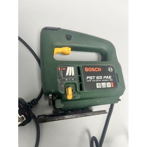 18 - Bosch PST 65 PAE Electronic SDS Jigsaw 400 W.
A single dark green and yellow Bosch PST 65 PAE electr... 