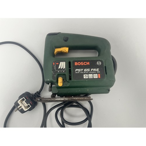 18 - Bosch PST 65 PAE Electronic SDS Jigsaw 400 W.
A single dark green and yellow Bosch PST 65 PAE electr... 