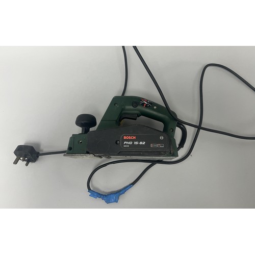 19 - Bosch PHO 15-82 Electric Hand Planer 500W.
A green and black Bosch electric hand planer, model PHO 1... 