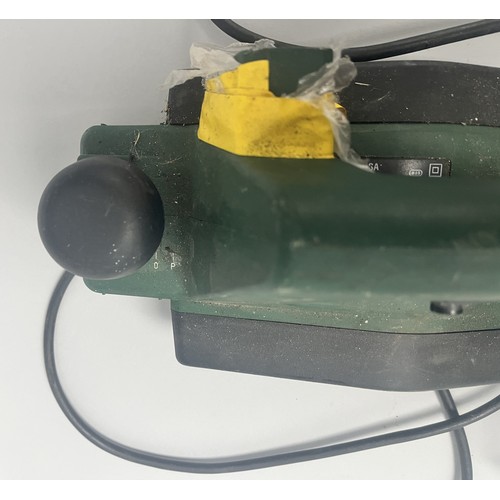 19 - Bosch PHO 15-82 Electric Hand Planer 500W.
A green and black Bosch electric hand planer, model PHO 1... 