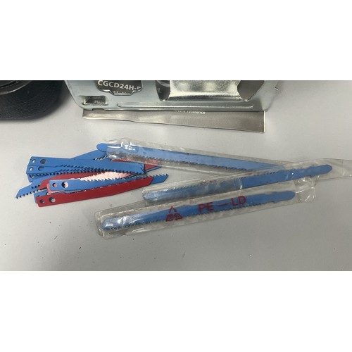 20 - COUGAR 630W Jigsaw Model CGCD24H-PJ630L and Accessories. A Collection of items including a grey and ... 