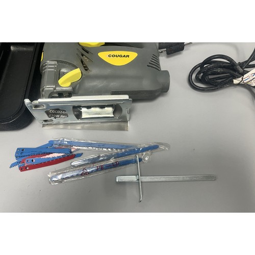 20 - COUGAR 630W Jigsaw Model CGCD24H-PJ630L and Accessories. A Collection of items including a grey and ... 