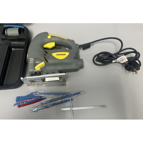 20 - COUGAR 630W Jigsaw Model CGCD24H-PJ630L and Accessories. A Collection of items including a grey and ... 