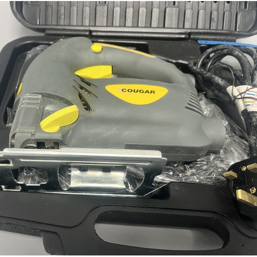 20 - COUGAR 630W Jigsaw Model CGCD24H-PJ630L and Accessories. A Collection of items including a grey and ... 