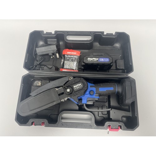 21 - DayPlus Mini Electric Chainsaw Kit with 21V Battery and Case. A DayPlus black and blue mini electric... 