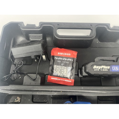 21 - DayPlus Mini Electric Chainsaw Kit with 21V Battery and Case. A DayPlus black and blue mini electric... 