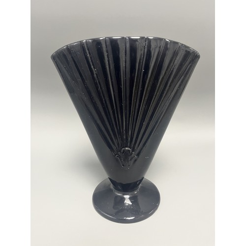 23 - Royal Haeger Art Deco Black Glass Fan Vase.
A single Art Deco-style footed vase attributed to Royal ... 