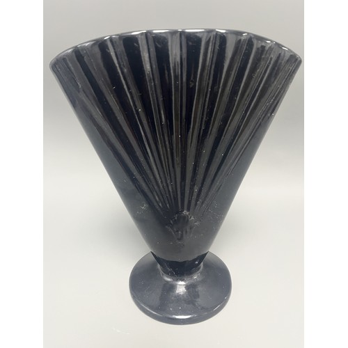 23 - Royal Haeger Art Deco Black Glass Fan Vase.
A single Art Deco-style footed vase attributed to Royal ... 