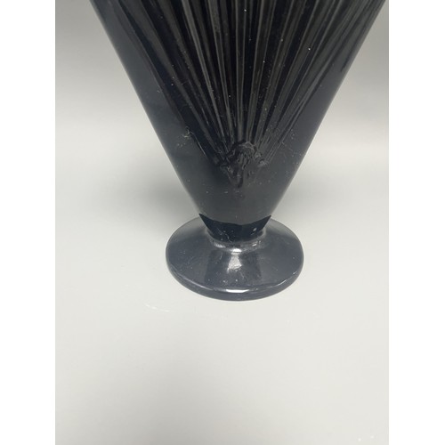23 - Royal Haeger Art Deco Black Glass Fan Vase.
A single Art Deco-style footed vase attributed to Royal ... 