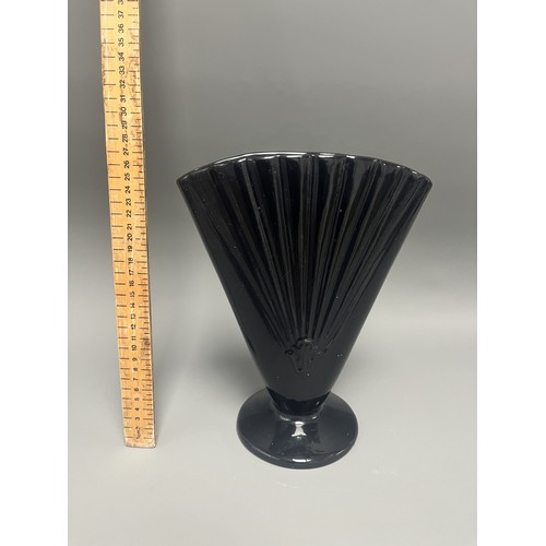 23 - Royal Haeger Art Deco Black Glass Fan Vase.
A single Art Deco-style footed vase attributed to Royal ... 