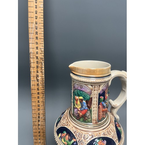 24 - Large S.P. Gerz German Historicism Polychrome Stoneware Pitcher. A large German stoneware pitcher or... 