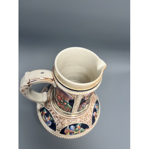 24 - Large S.P. Gerz German Historicism Polychrome Stoneware Pitcher. A large German stoneware pitcher or... 