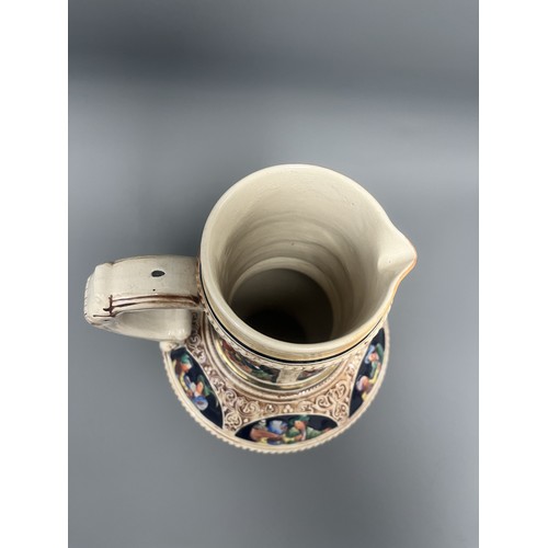24 - Large S.P. Gerz German Historicism Polychrome Stoneware Pitcher. A large German stoneware pitcher or... 