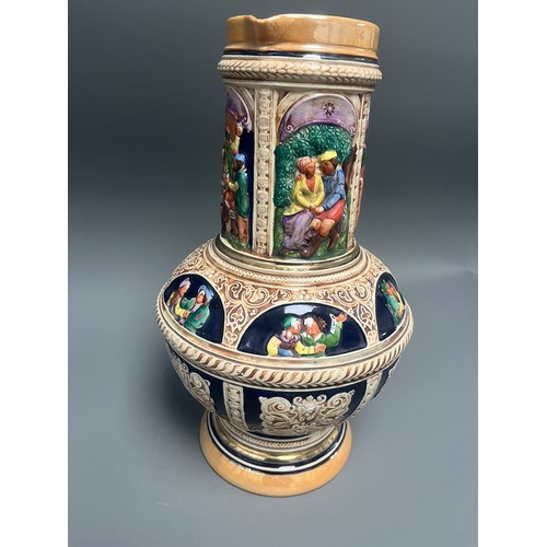 24 - Large S.P. Gerz German Historicism Polychrome Stoneware Pitcher. A large German stoneware pitcher or... 