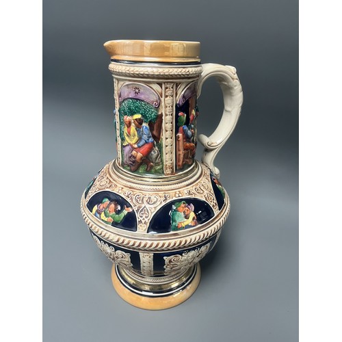 24 - Large S.P. Gerz German Historicism Polychrome Stoneware Pitcher. A large German stoneware pitcher or... 