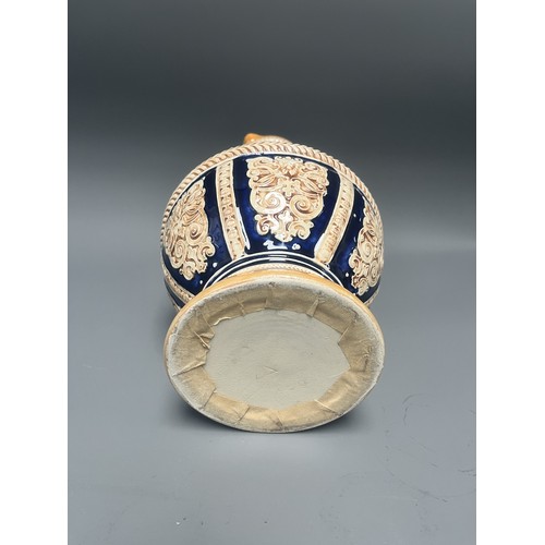 24 - Large S.P. Gerz German Historicism Polychrome Stoneware Pitcher. A large German stoneware pitcher or... 