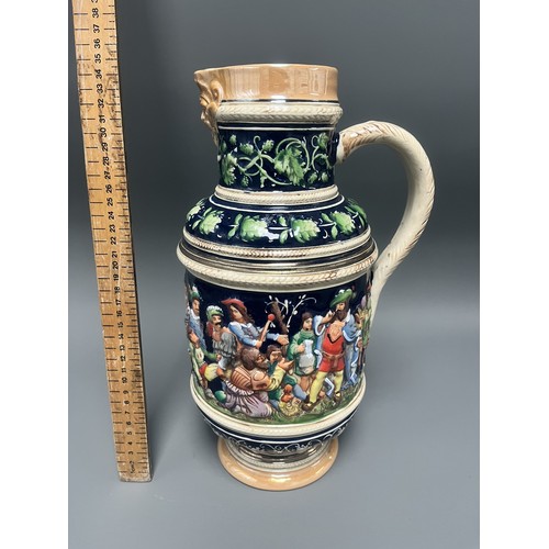 25 - A Large Historicist Polychrome Earthenware Ewer or Jug, Late 19th/Early 20th Century
A single histor... 