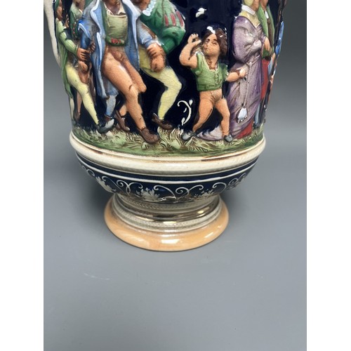 25 - A Large Historicist Polychrome Earthenware Ewer or Jug, Late 19th/Early 20th Century
A single histor... 