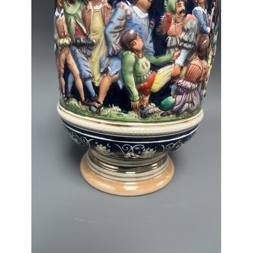 25 - A Large Historicist Polychrome Earthenware Ewer or Jug, Late 19th/Early 20th Century
A single histor... 
