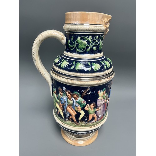 25 - A Large Historicist Polychrome Earthenware Ewer or Jug, Late 19th/Early 20th Century
A single histor... 
