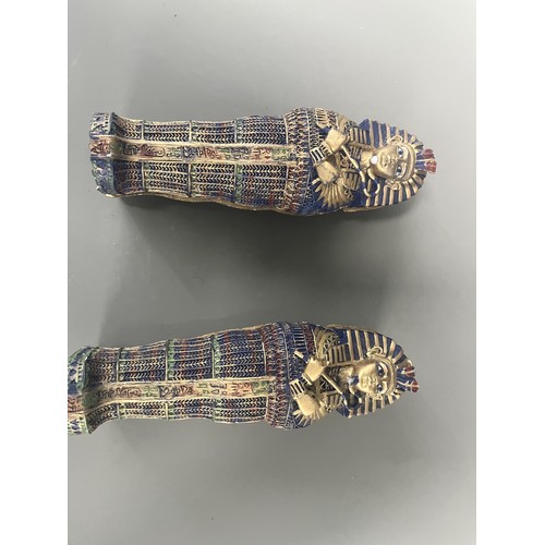 29 - A Pair of Egyptian Revival Painted Resin Anthropoid Sarcophagus Boxes. A pair of modern decorative l... 