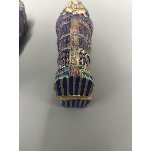 29 - A Pair of Egyptian Revival Painted Resin Anthropoid Sarcophagus Boxes. A pair of modern decorative l... 