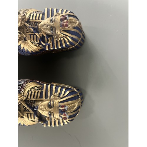 29 - A Pair of Egyptian Revival Painted Resin Anthropoid Sarcophagus Boxes. A pair of modern decorative l... 