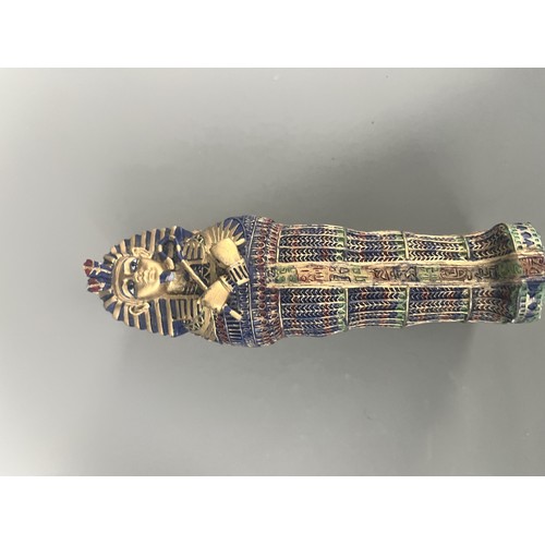 29 - A Pair of Egyptian Revival Painted Resin Anthropoid Sarcophagus Boxes. A pair of modern decorative l... 