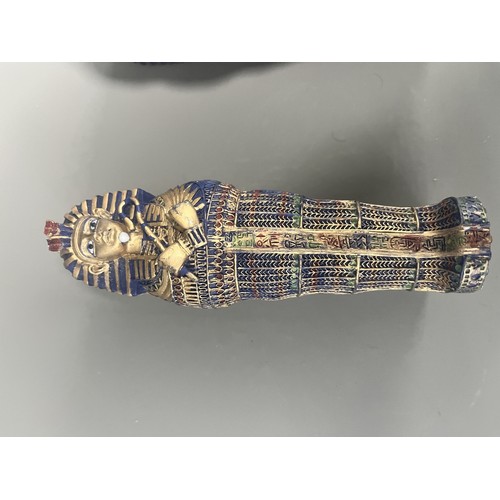 29 - A Pair of Egyptian Revival Painted Resin Anthropoid Sarcophagus Boxes. A pair of modern decorative l... 
