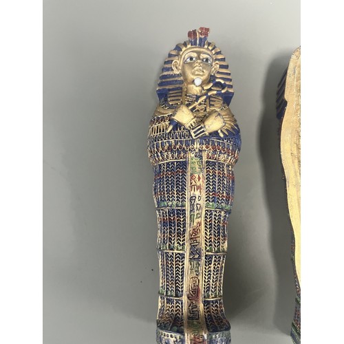 29 - A Pair of Egyptian Revival Painted Resin Anthropoid Sarcophagus Boxes. A pair of modern decorative l... 