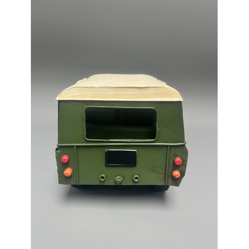 35 - Retro Style Tin Model of a Land Rover 109 Station Wagon. A large decorative model vehicle crafted fr... 