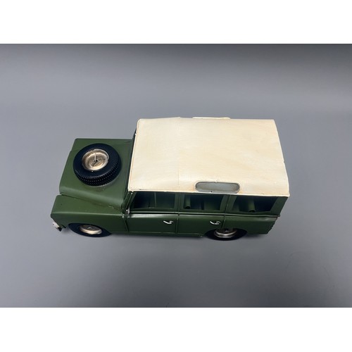 35 - Retro Style Tin Model of a Land Rover 109 Station Wagon. A large decorative model vehicle crafted fr... 