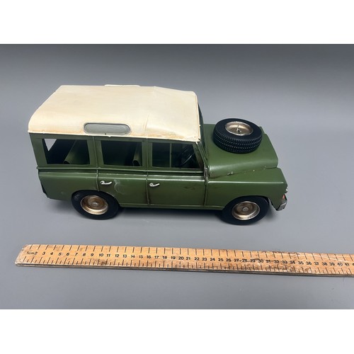 35 - Retro Style Tin Model of a Land Rover 109 Station Wagon. A large decorative model vehicle crafted fr... 