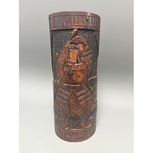 40 - Antique Carved Bamboo Brush Pot Depicting a Samurai Warrior. A large antique hand-carved cylindrical... 