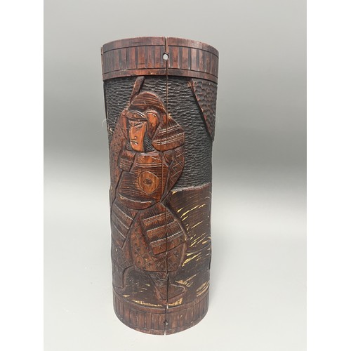 40 - Antique Carved Bamboo Brush Pot Depicting a Samurai Warrior. A large antique hand-carved cylindrical... 
