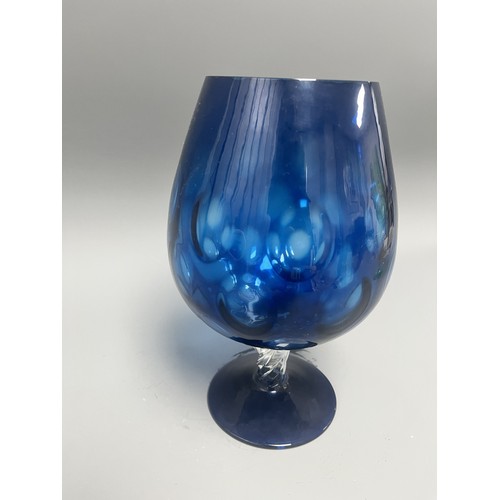 44 - Mid-Century Style Cobalt Blue Art Glass Stemmed Goblet with Internal White Decoration.
A single hand... 